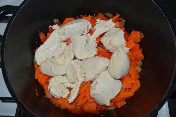 add the chicken breast to the pot