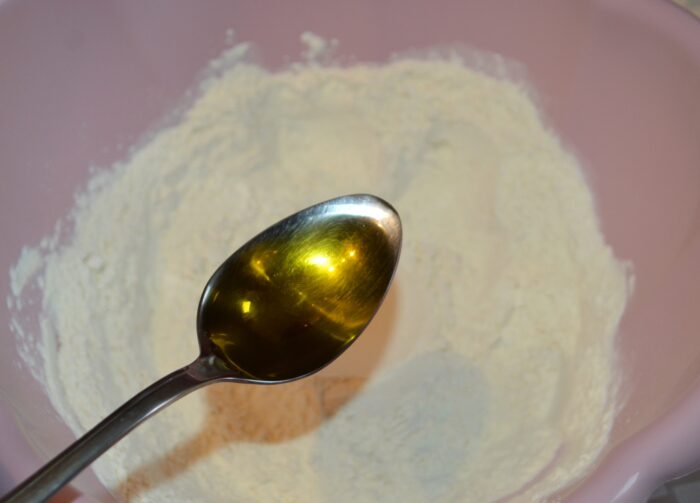 Pour in the olive oil