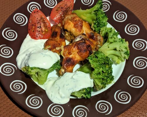 Serve the wings and broccoli with a cream sauce