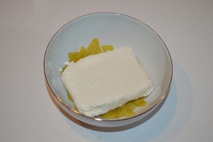 Add cottage cheese to the peppers