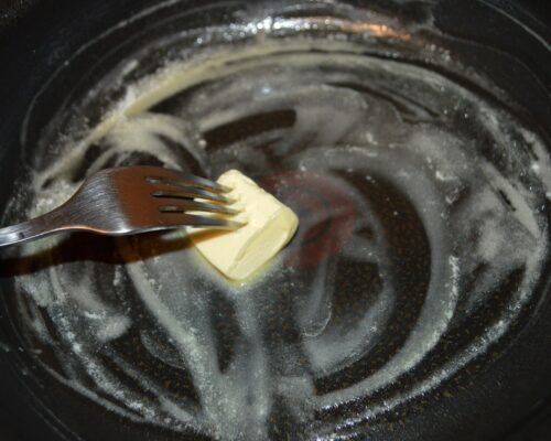 heat a little butter in a skillet
