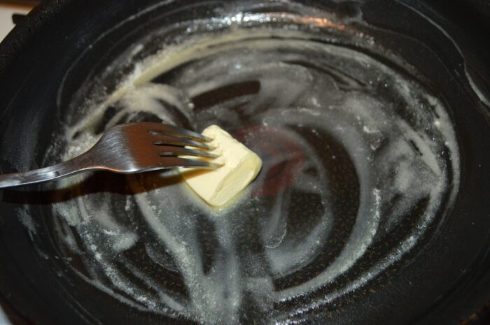 heat a little butter in a skillet