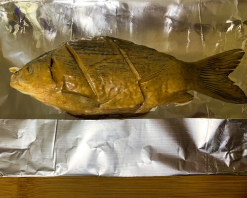 Coat the carp with the mixture