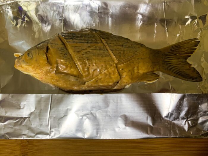 Coat the carp with the mixture