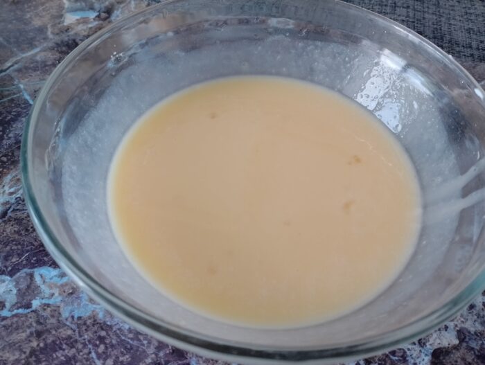 The sour cream should be beaten with the egg