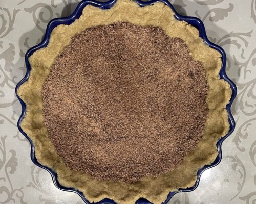 Sprinkle chocolate flakes over the dough
