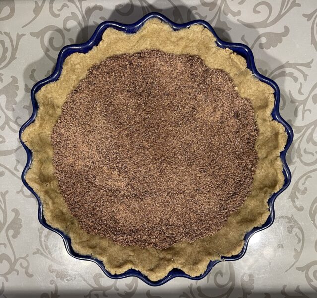 Sprinkle chocolate flakes over the dough