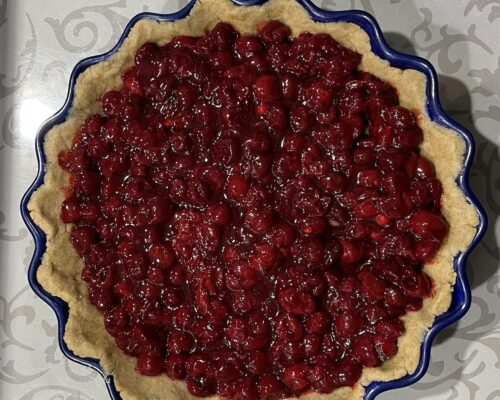 Place the cooled cherries on the second layer