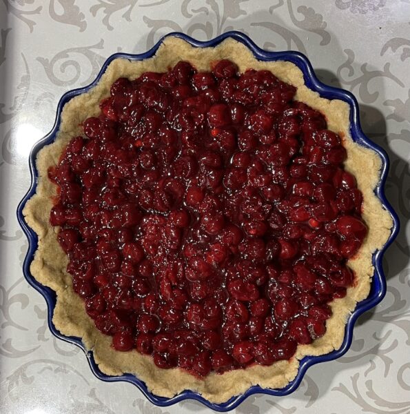 Place the cooled cherries on the second layer