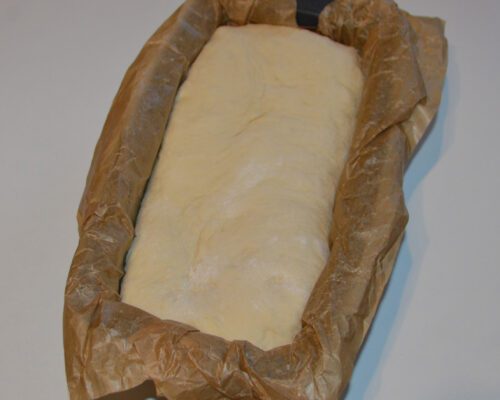 Place the bread on a loaf pan