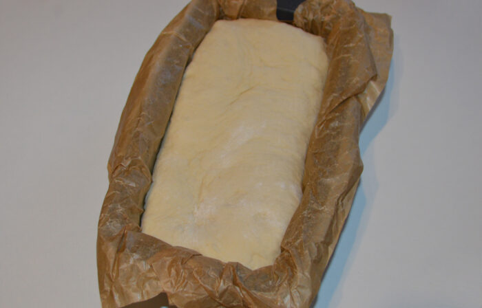 Place the bread on a loaf pan
