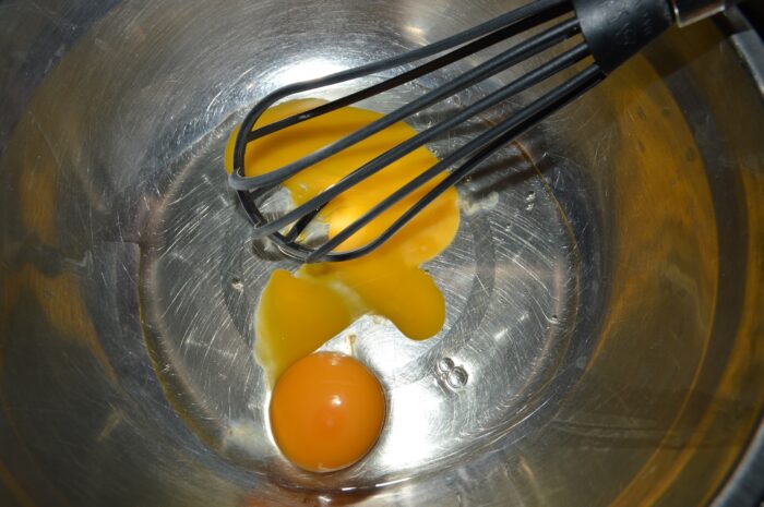 Break the eggs into a bowl