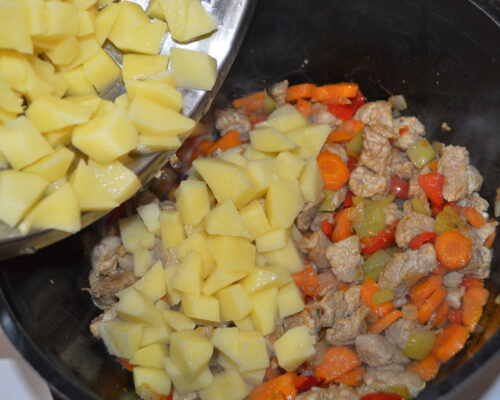 Cut the potatoes into cubes