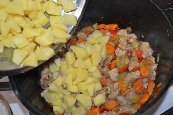 Cut the potatoes into cubes