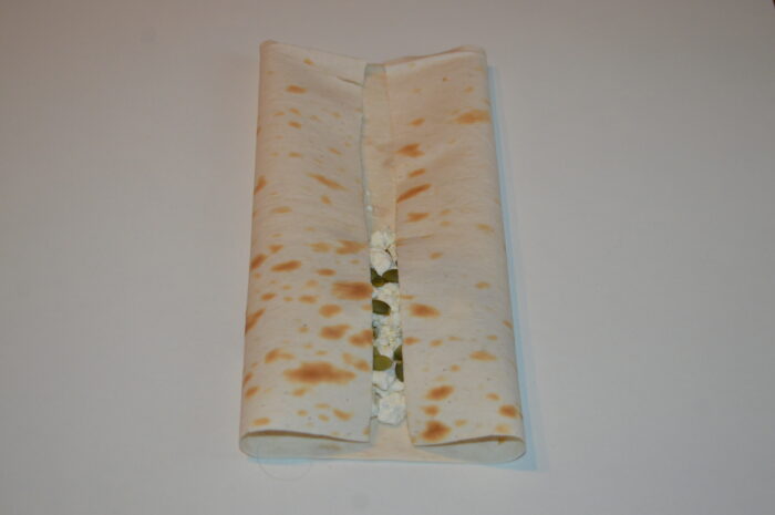 Bring the ends of the lavash together