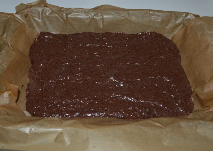 Pour the mixture into a baking tray