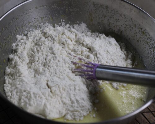 Add the flour and mix the dough