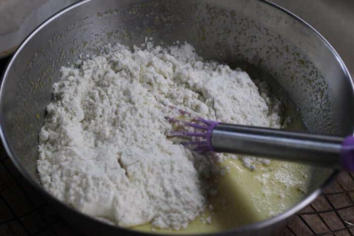 Add the flour and mix the dough