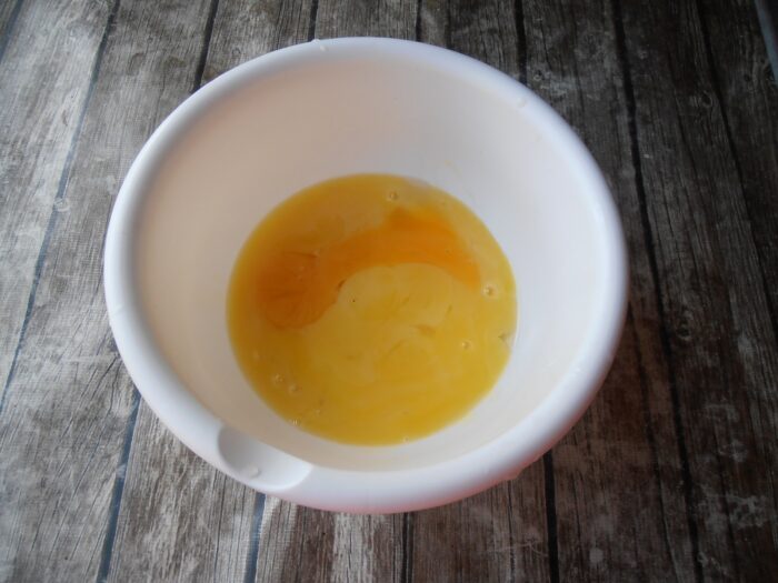 Separate the eggs into whites and yolks