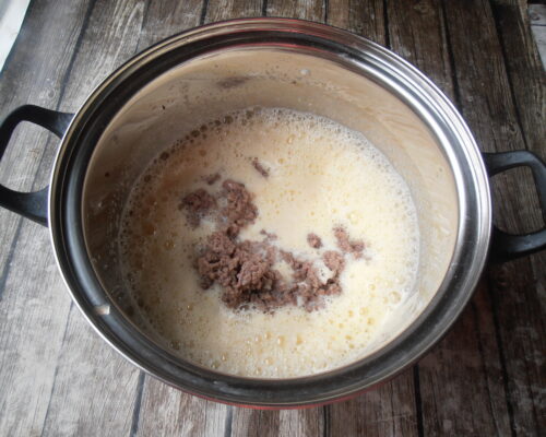 Add the beef to the eggs
