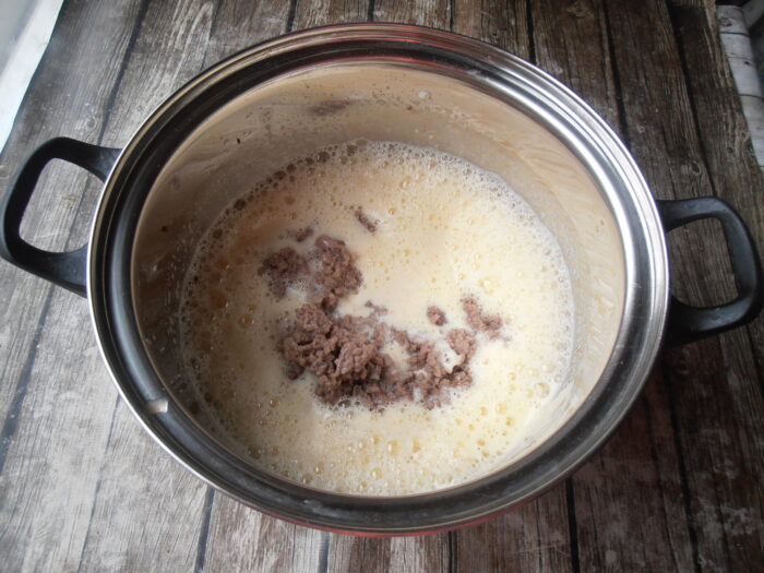 Add the beef to the eggs