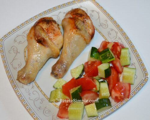 Air fryer chicken drumsticks with crispy golden skin and salad