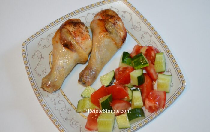 Air fryer chicken drumsticks with crispy golden skin and salad