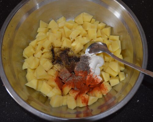 Peel the potatoes and cut