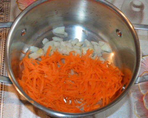 Add the diced onion and grated carrot