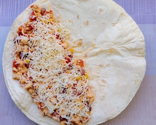 Top with a thin layer of grated cheese