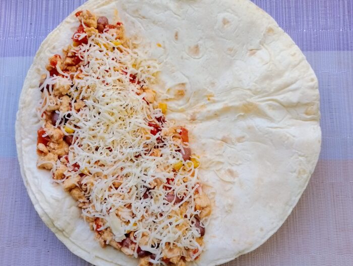Top with a thin layer of grated cheese