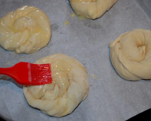 Beat an egg and brush it onto the pies