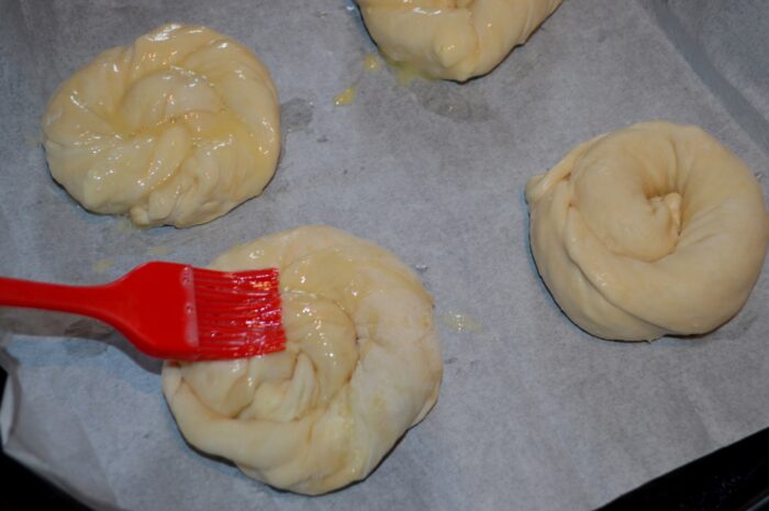 Beat an egg and brush it onto the pies