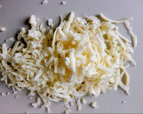 Grate the cheese in the same way