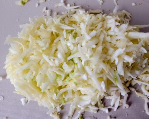 Clean the zucchini and grate