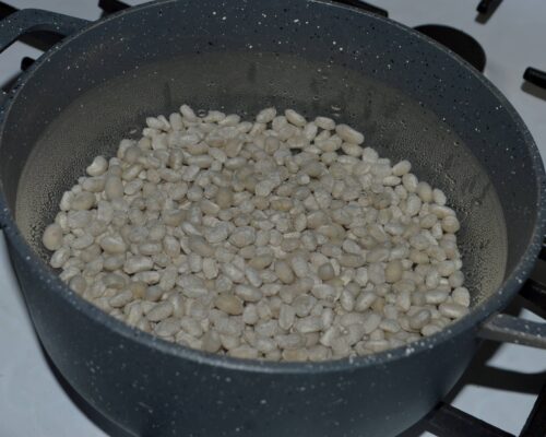 Wash the beans and simmer