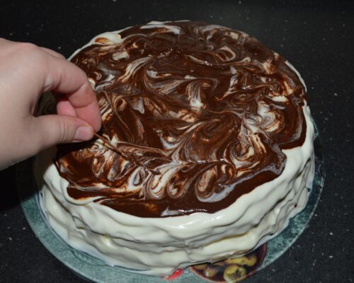 Pour the glaze over the cake