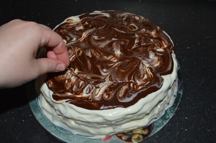 Pour the glaze over the cake