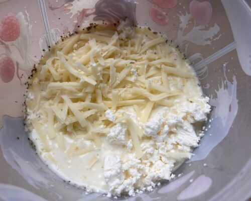 Add the grated sulguni cheese