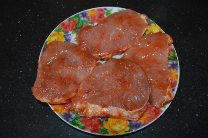 The pork chops are already purchased in marinade