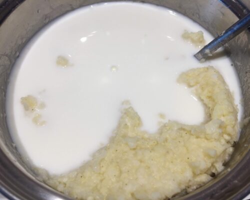 Add milk to the porridge