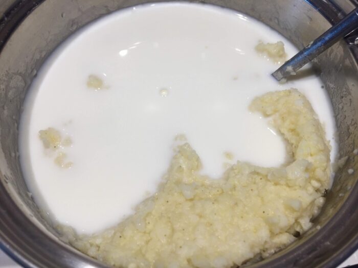 Add milk to the porridge