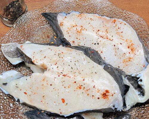 Sprinkle the thawed steaks with lemon juice