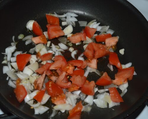 Chop the tomato and add