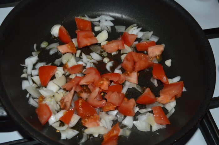 Chop the tomato and add