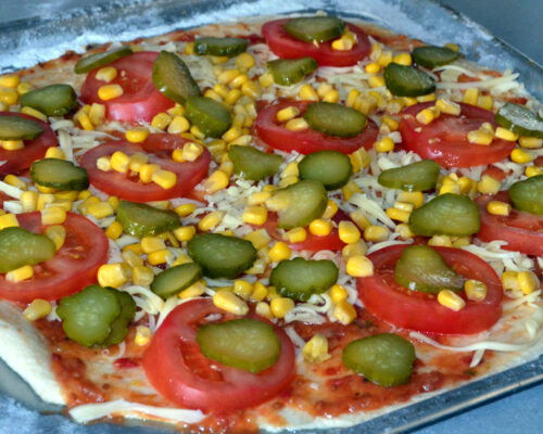 Add the sliced pickled cucumbers