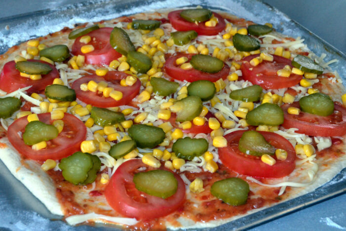 Add the sliced pickled cucumbers