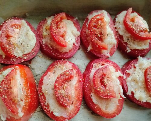 Cut the tomatoes in half