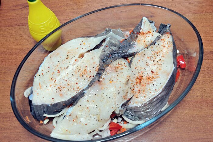 Place the catfish steaks on top of them