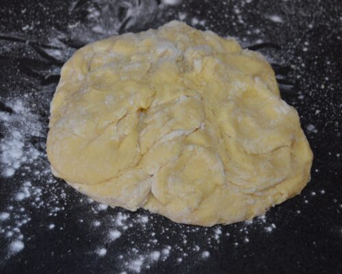 Sprinkle a little flour on the table